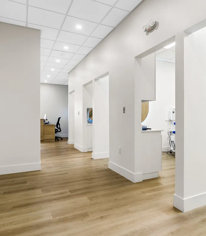 Hallway leading to private treatment rooms at Sepe Dental